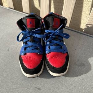 Red, white and blue Jordan sneakers